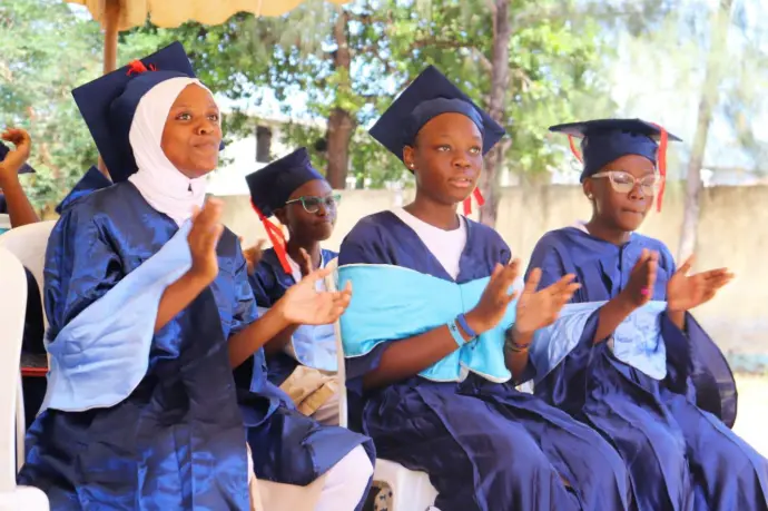 Shikaadabu Secondary School English access students during their graduation